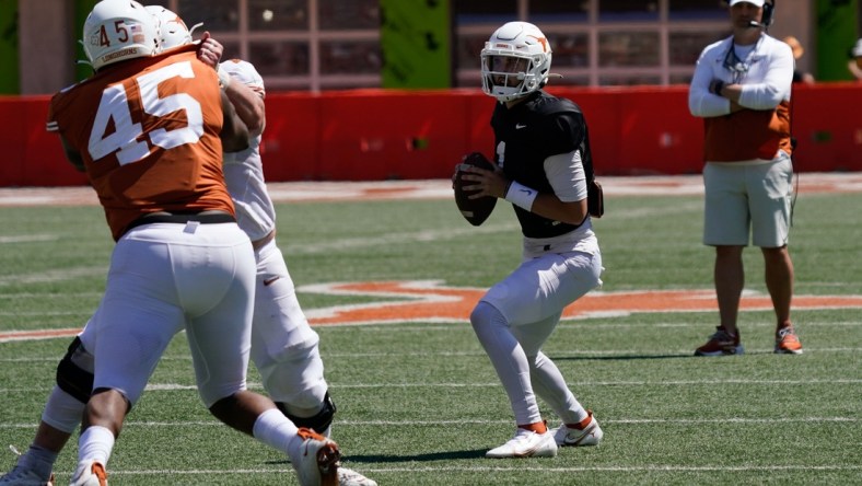 Apr 24, 2021; Austin, Texas, USA; Texas Longhorns White quarterback Hudson Card (1) looks to pass against the Texas Longhorns Orange team in the fourth quarter at the Orange-White Texas Spring Game at Darrell K Royal-Texas Memorial Stadium. Mandatory Credit: Scott Wachter-USA TODAY Sports