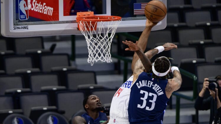 May 28, 2021; Dallas, Texas, USA; Dallas Mavericks center Willie Cauley-Stein (33) is called for a flagrant foul on LA Clippers guard Terance Mann (14) during the first quarter in game three in the first round of the 2021 NBA Playoffs at American Airlines Center. Mandatory Credit: Jerome Miron-USA TODAY Sports