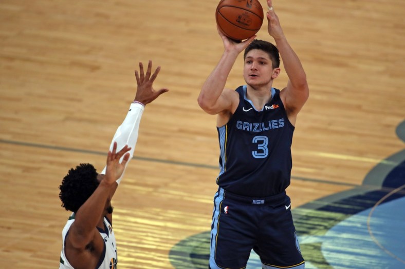 May 31, 2021; Memphis, Tennessee, USA; Memphis Grizzlies guard Grayson Allen (3) shoots for three during the second quarter during game four in the first round of the 2021 NBA Playoffs against the Utah Jazz at FedExForum. Mandatory Credit: Petre Thomas-USA TODAY Sports