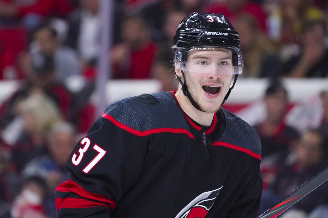 Jun 8, 2021; Raleigh, North Carolina, USA; Carolina Hurricanes right wing Andrei Svechnikov (37) reacts against the Tampa Bay Lightning in game five of the second round of the 2021 Stanley Cup Playoffs at PNC Arena. Mandatory Credit: James Guillory-USA TODAY Sports