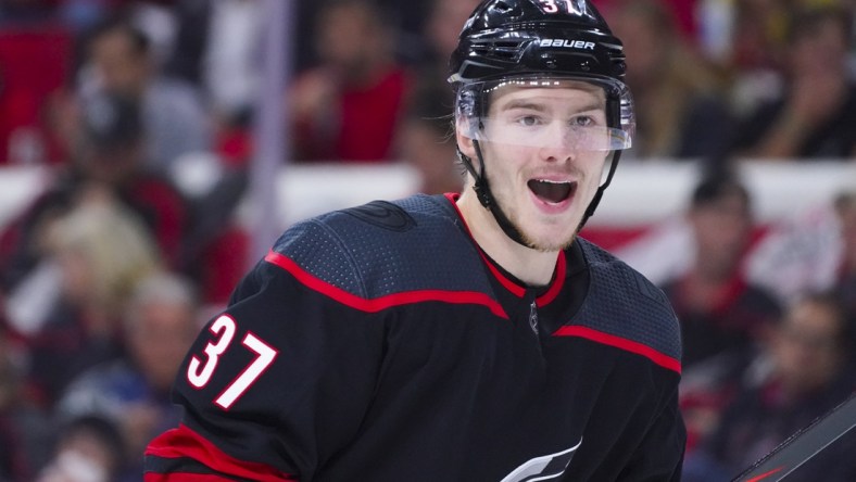 Jun 8, 2021; Raleigh, North Carolina, USA; Carolina Hurricanes right wing Andrei Svechnikov (37) reacts against the Tampa Bay Lightning in game five of the second round of the 2021 Stanley Cup Playoffs at PNC Arena. Mandatory Credit: James Guillory-USA TODAY Sports