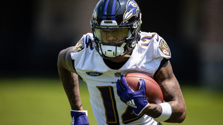 May 26, 2021; Owings Mills, Maryland, USA; Baltimore Ravens wide receiver Rashod Bateman (12) in action during an OTA at Under Armour Performance Center. Mandatory Credit: Scott Taetsch-USA TODAY Sports