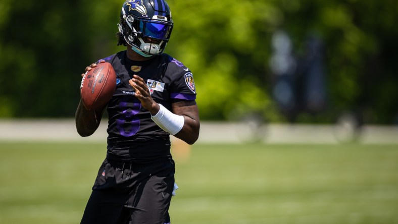 May 26, 2021; Owings Mills, Maryland, USA; Baltimore Ravens quarterback Lamar Jackson (8) in action during an OTA at Under Armour Performance Center. Mandatory Credit: Scott Taetsch-USA TODAY Sports