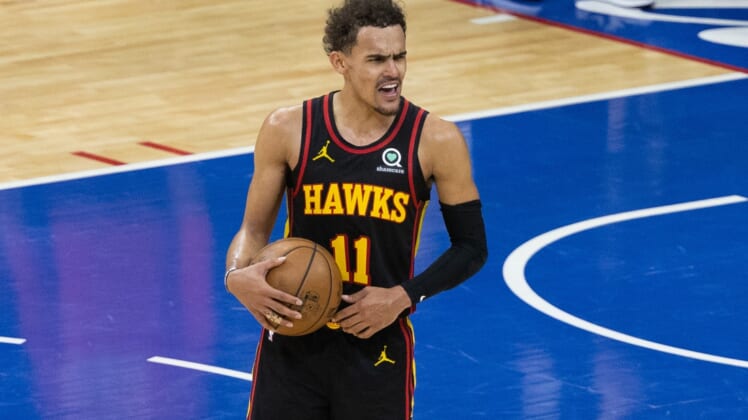 Jun 20, 2021; Philadelphia, Pennsylvania, USA; Atlanta Hawks guard Trae Young (11) reacts with fans in the closing seconds of a victory against the Philadelphia 76ers in game seven of the second round of the 2021 NBA Playoffs at Wells Fargo Center. Mandatory Credit: Bill Streicher-USA TODAY Sports