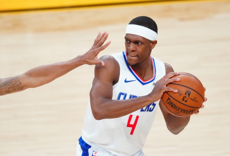 Jun 22, 2021; Phoenix, Arizona, USA; Los Angeles Clippers guard Rajon Rondo (4) against the Phoenix Suns during game two of the Western Conference Finals for the 2021 NBA Playoffs at Phoenix Suns Arena. Mandatory Credit: Mark J. Rebilas-USA TODAY Sports