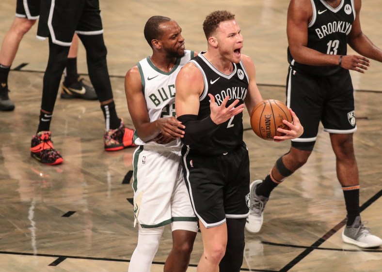 Jun 19, 2021; Brooklyn, New York, USA; Milwaukee Bucks forward Khris Middleton (22) and Brooklyn Nets forward Blake Griffin (2) during game seven in the second round of the 2021 NBA Playoffs at Barclays Center. Mandatory Credit: Wendell Cruz-USA TODAY Sports
