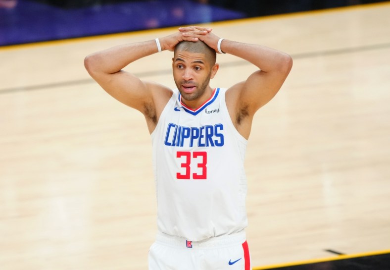 Jun 22, 2021; Phoenix, Arizona, USA; Los Angeles Clippers forward Nicolas Batum (33) reacts against the Phoenix Suns during game two of the Western Conference Finals for the 2021 NBA Playoffs at Phoenix Suns Arena. Mandatory Credit: Mark J. Rebilas-USA TODAY Sports