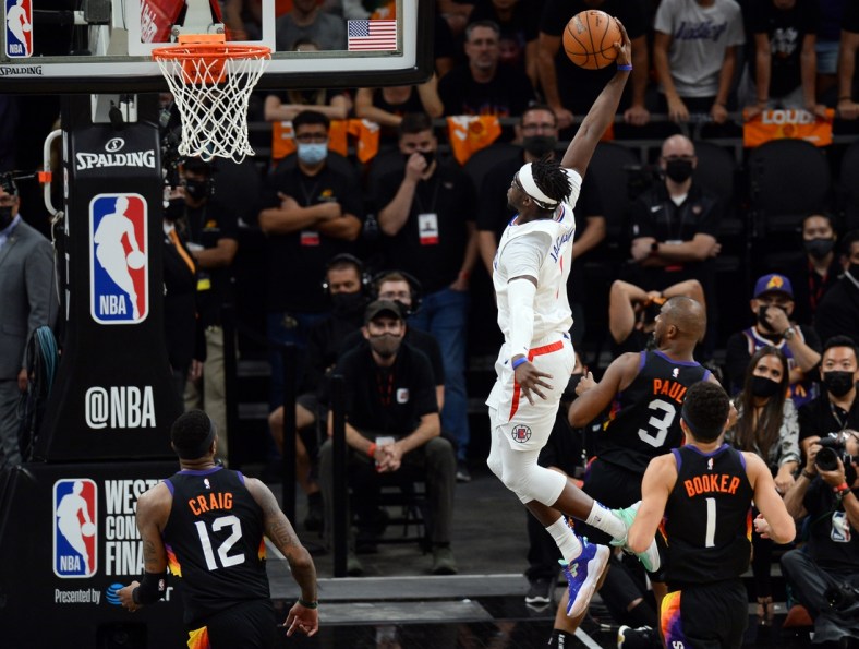 Jun 28, 2021; Phoenix, Arizona, USA; LA Clippers guard Reggie Jackson (1) dunks against the Phoenix Suns during the second half of game five of the Western Conference Finals for the 2021 NBA Playoffs at Phoenix Suns Arena. Mandatory Credit: Joe Camporeale-USA TODAY Sports
