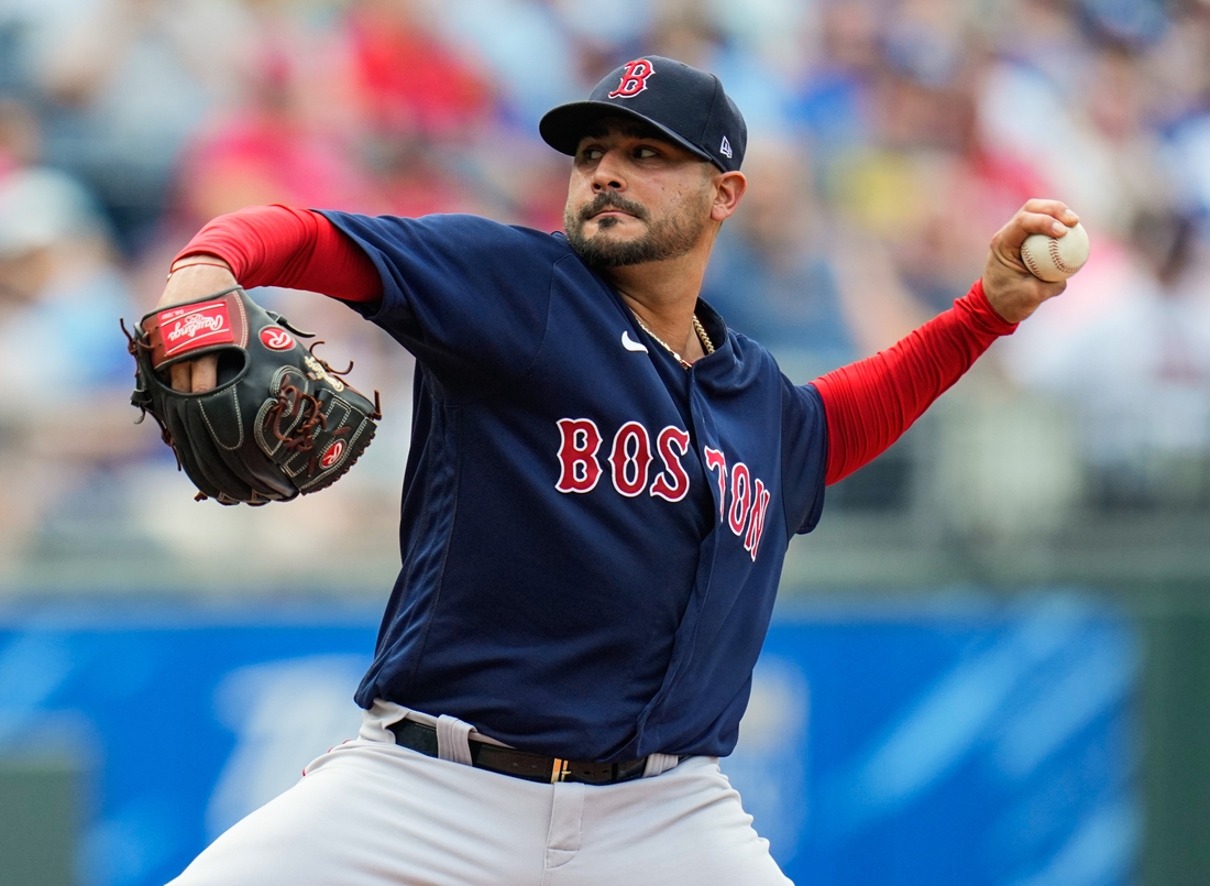 Jun 19, 2021; Kansas City, Missouri, USA; Boston Red Sox starting pitcher Martin Perez (54) pitches against the Kansas City Royals during the first inning at Kauffman Stadium. Mandatory Credit: Jay Biggerstaff-USA TODAY Sports