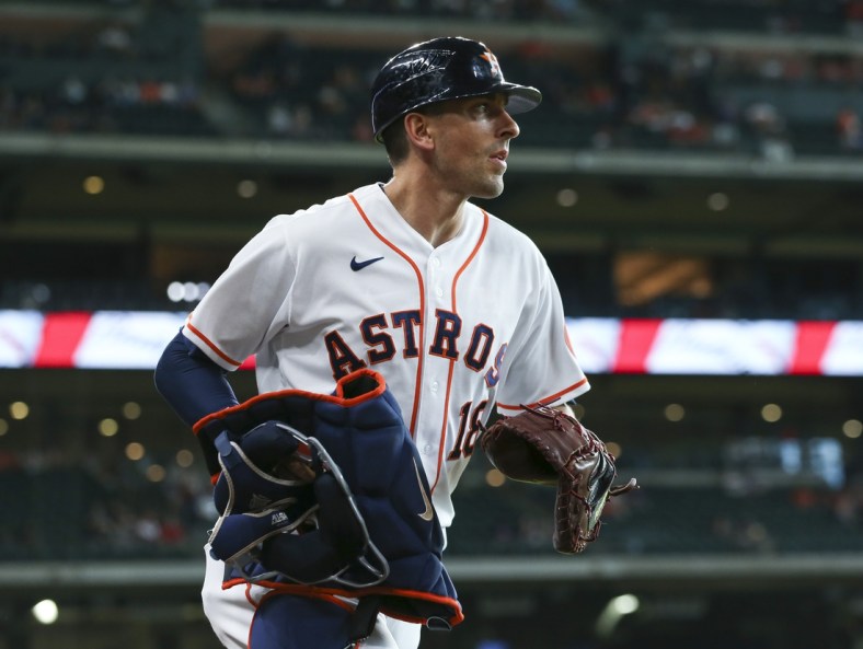 Jun 30, 2021; Houston, Texas, USA; Houston Astros catcher Jason Castro (18) jogs onto the field before the game against the Baltimore Orioles at Minute Maid Park. Mandatory Credit: Troy Taormina-USA TODAY Sports