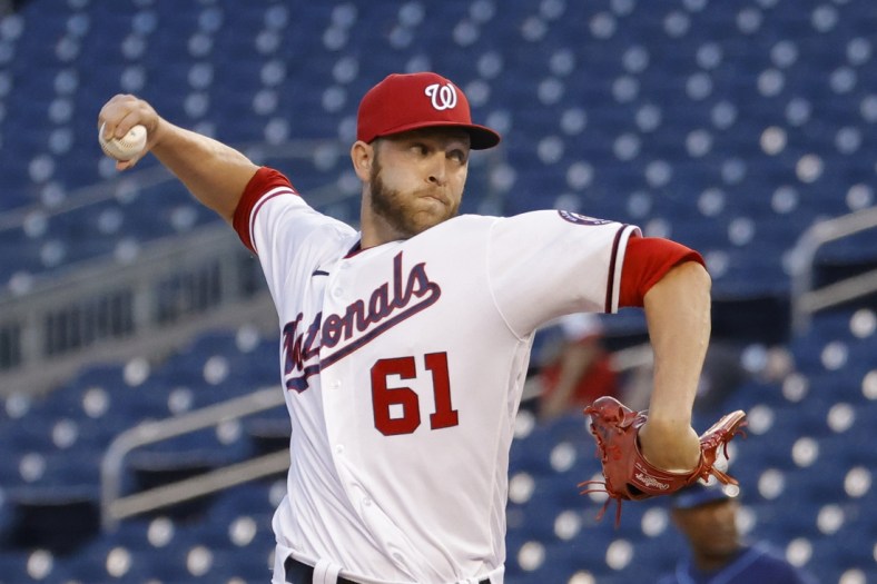 Jun 30, 2021; Washington, District of Columbia, USA; Washington Nationals relief pitcher Kyle McGowin (61) pitches against the Tampa Bay Rays in the ninth inning at Nationals Park. Mandatory Credit: Geoff Burke-USA TODAY Sports