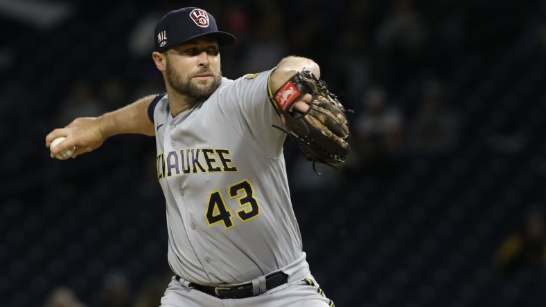 Jul 2, 2021; Pittsburgh, Pennsylvania, USA;  Milwaukee Brewers relief pitcher Hunter Strickland (43) pitches against the Pittsburgh Pirates during the ninth inning at PNC Park. The Brewers won 7-2. Mandatory Credit: Charles LeClaire-USA TODAY Sports