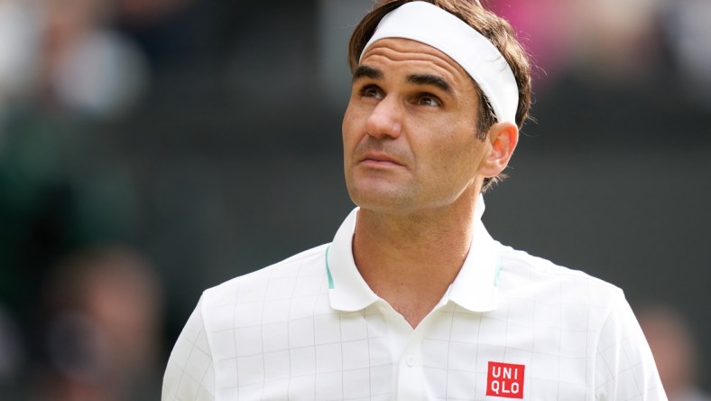 Jul 7, 2021; London, United Kingdom; Roger Federer (SUI) plays against Hubert Hurkacz (POL) in the quarter finals at All England Lawn Tennis and Croquet Club. Mandatory Credit: Peter van den Berg-USA TODAY Sports