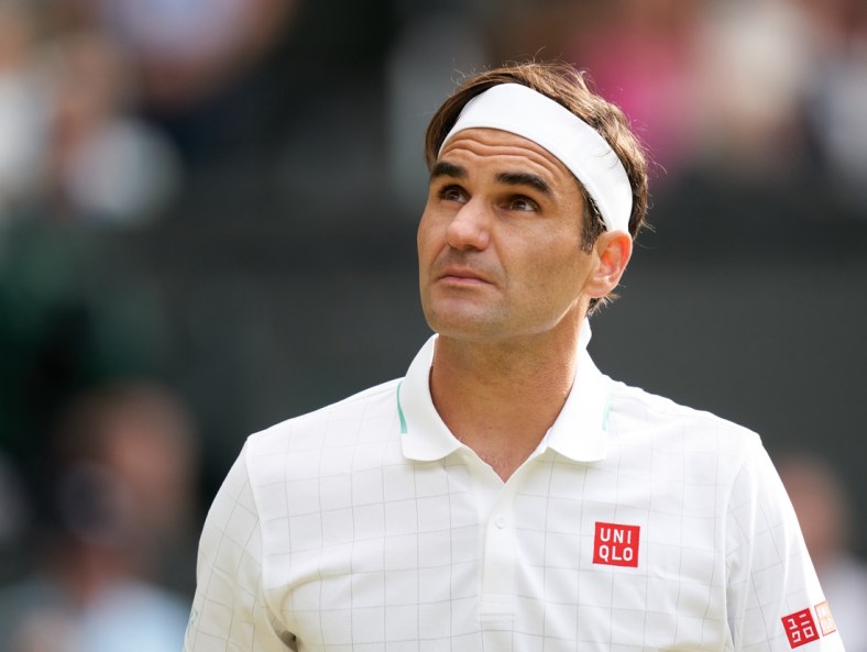 Jul 7, 2021; London, United Kingdom; Roger Federer (SUI) plays against Hubert Hurkacz (POL) in the quarter finals at All England Lawn Tennis and Croquet Club. Mandatory Credit: Peter van den Berg-USA TODAY Sports