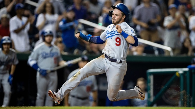 Jul 3, 2021; Washington, District of Columbia, USA; Los Angeles Dodgers shortstop Gavin Lux (9) scores a run during the game against the Washington Nationals at Nationals Park. Mandatory Credit: Scott Taetsch-USA TODAY Sports