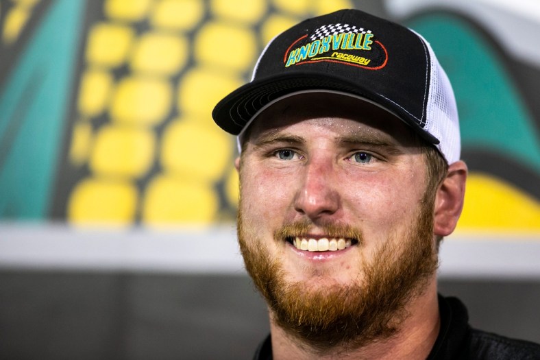 NASCAR Camping World Truck Series driver Austin Hill (16) poses for photos after winning the Corn Belt 150, Friday, July 9, 2021, at the Knoxville Raceway in Knoxville, Iowa.

210709 Corn Belt 150 005 Jpg