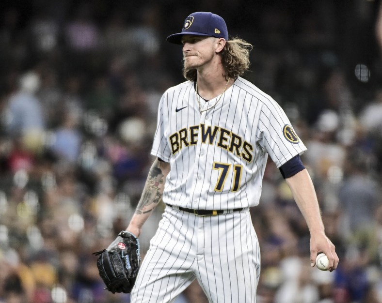 Jul 11, 2021; Milwaukee, Wisconsin, USA;  Milwaukee Brewers pitcher Josh Hader (71) reacts after giving up 2 runs in the ninth inning against the Cincinnati Reds at American Family Field. Mandatory Credit: Benny Sieu-USA TODAY Sports