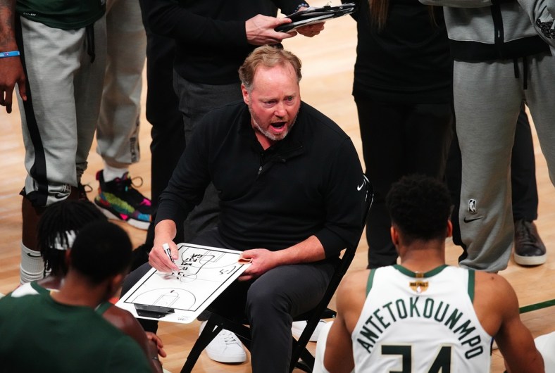 Jul 14, 2021; Milwaukee, Wisconsin, USA; Milwaukee Bucks head coach Mike Budenholzer talks with his team during a time out in the fourth quarter against the Phoenix Suns during game four of the 2021 NBA Finals at Fiserv Forum. Mandatory Credit: Mark J. Rebilas-USA TODAY Sports