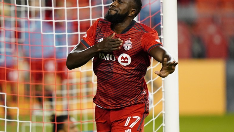 Jul 17, 2021; Toronto, Ontario, USA; Toronto FC forward Jozy Altidore (17) celebrates after scoring a goal against Orlando City during the second half at BMO Field. Mandatory Credit: John E. Sokolowski-USA TODAY Sports