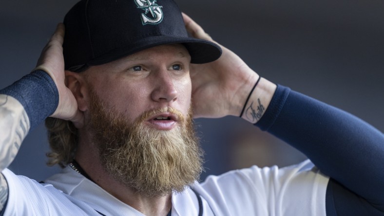 Jul 7, 2021; Seattle, Washington, USA; Seattle Mariners outfielder Jake Fraley (28) is pictured in the dugout before a game against the New York Yankeesat T-Mobile Park. The Yankees won 5-4. Mandatory Credit: Stephen Brashear-USA TODAY Sports