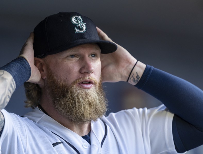 Jul 7, 2021; Seattle, Washington, USA; Seattle Mariners outfielder Jake Fraley (28) is pictured in the dugout before a game against the New York Yankeesat T-Mobile Park. The Yankees won 5-4. Mandatory Credit: Stephen Brashear-USA TODAY Sports