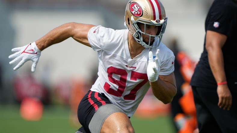 Jul 28, 2021; Santa Clara, CA, USA;  San Francisco 49ers defensive end Nick Bosa (97) runs during training camp at the SAP Performance Facility.  Mandatory Credit: Stan Szeto-USA TODAY Sports