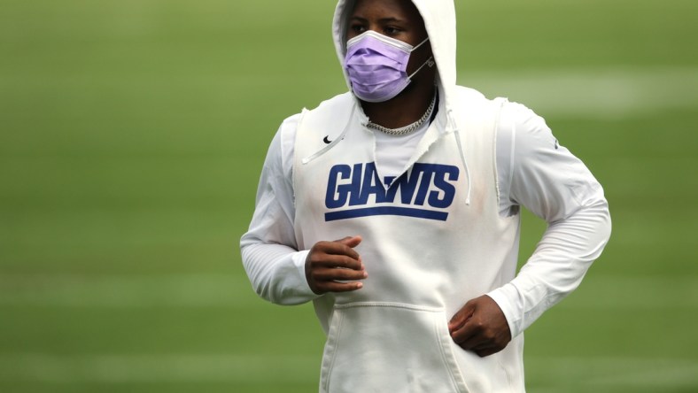 Running back Saquon Barkley jogs off the field at the end of Giants practice, in East Rutherford. Wednesday, July 28, 2021Giants