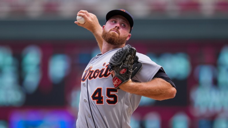 Jul 28, 2021; Minneapolis, Minnesota, USA; Detroit Tigers relief pitcher Buck Farmer (45) pitches against the Minnesota Twins in the eighth inning at Target Field. Mandatory Credit: Brad Rempel-USA TODAY Sports