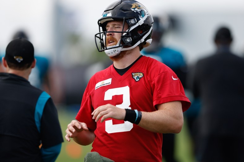 Jul 30, 2021; Jacksonville, FL, USA;  Jacksonville Jaguars quarterback C.J. Beathard (3) participates in training camp at Dream Finders Homes practice field Mandatory Credit: Nathan Ray Seebeck-USA TODAY Sports