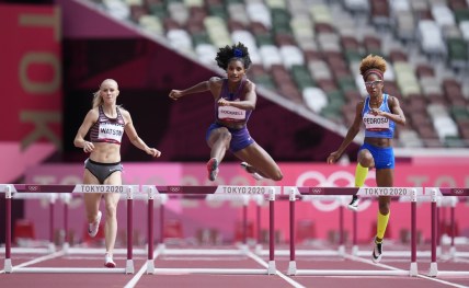Jul 31, 2021; Tokyo, Japan; From left Sage Watson (CAN), Anna Cockrell (USA) and Yadisleidis Pedroso (ITA) race in the women's 400m hurdles round 1 during the Tokyo 2020 Olympic Summer Games at Olympic Stadium. Mandatory Credit: James Lang-USA TODAY Sports