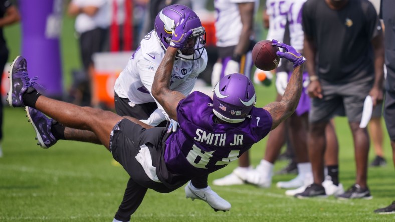 Jul 30, 2021; Eagan, MN, United States; Minnesota Vikings tight end Irv Smith Jr. (84) catches a pass at training camp at TCO Performance Center. Mandatory Credit: Brad Rempel-USA TODAY Sports