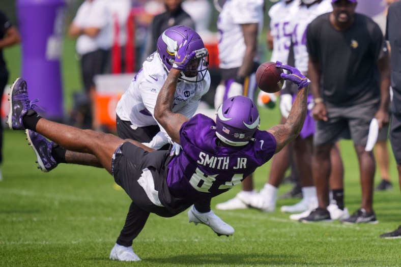 Jul 30, 2021; Eagan, MN, United States; Minnesota Vikings tight end Irv Smith Jr. (84) catches a pass at training camp at TCO Performance Center. Mandatory Credit: Brad Rempel-USA TODAY Sports