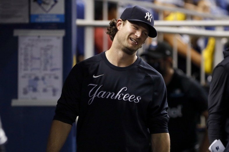 Jul 31, 2021; Miami, Florida, USA; New York Yankees starting pitcher Gerrit Cole (45) reacts from the dugout during the game against the Miami Marlins at loanDepot Park. Mandatory Credit: Sam Navarro-USA TODAY Sports