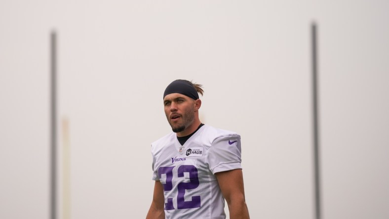 Jul 30, 2021; Eagan, MN, United States; Minnesota Vikings defensive back Harrison Smith (22) takes the field at training camp at TCO Performance Center. Mandatory Credit: Brad Rempel-USA TODAY Sports
