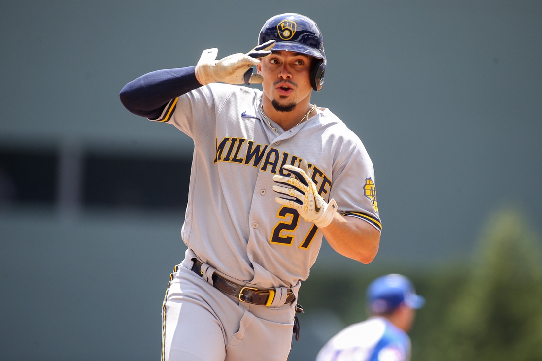 Aug 1, 2021; Atlanta, Georgia, USA; Milwaukee Brewers shortstop Willy Adames (27) celebrates after hitting a home run against the Atlanta Braves in the first inning at Truist Park. Mandatory Credit: Brett Davis-USA TODAY Sports