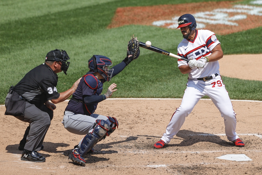 Aug 1, 2021; Chicago, Illinois, USA; Chicago White Sox first baseman Jose Abreu (79) is hit by a pitch from Cleveland Indians starting pitcher Cal Quantrill (not pictured) during the fifth inning at Guaranteed Rate Field. Mandatory Credit: Kamil Krzaczynski-USA TODAY Sports