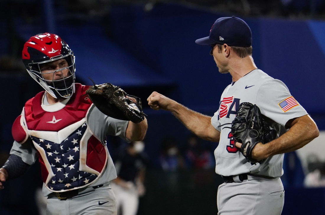 Aug 2, 2021; Yokohama, Japan; Team United States pitcher David Robertson (30) celebrates after getting out of the 8th inning against Japan in a second round baseball game during the Tokyo 2020 Olympic Summer Games at Yokohama Baseball Stadium. Mandatory Credit: Mandi Wright-USA TODAY Sports