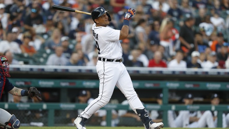 Aug 3, 2021; Detroit, Michigan, USA; Detroit Tigers designated hitter Miguel Cabrera (24) hits a solo home run against the Boston Red Sox during the second inning at Comerica Park. Mandatory Credit: Raj Mehta-USA TODAY Sports