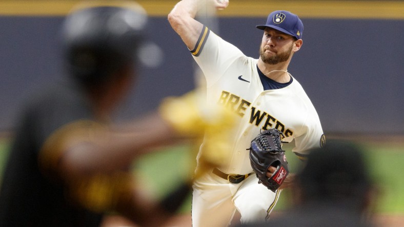 Aug 3, 2021; Milwaukee, Wisconsin, USA;  Milwaukee Brewers pitcher Adrian Houser (37) throws a pitch against the Pittsburgh Pirates during the first inning at American Family Field. Mandatory Credit: Jeff Hanisch-USA TODAY Sports