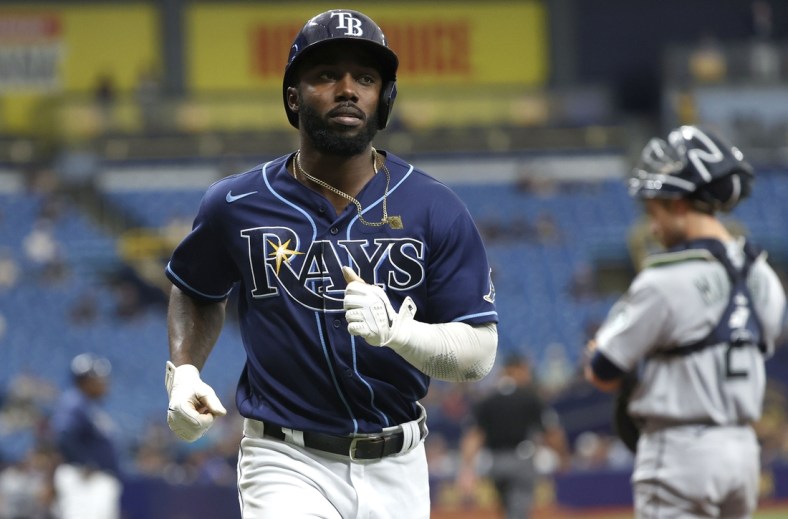 Aug 4, 2021; St. Petersburg, Florida, USA; Tampa Bay Rays left fielder Randy Arozarena (56) scores a run during the third inning against the Seattle Mariners at Tropicana Field. Mandatory Credit: Kim Klement-USA TODAY Sports