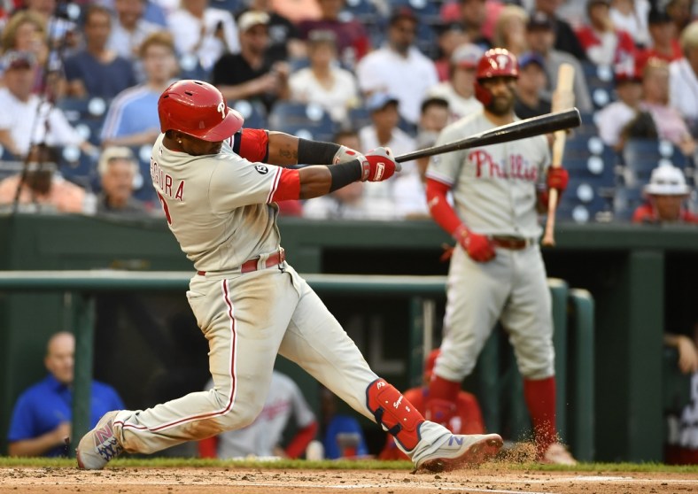 Aug 4, 2021; Washington, District of Columbia, USA; Philadelphia Phillies second baseman Jean Segura (2) hits an RBI double against the Washington Nationals during the third inning at Nationals Park. Mandatory Credit: Brad Mills-USA TODAY Sports