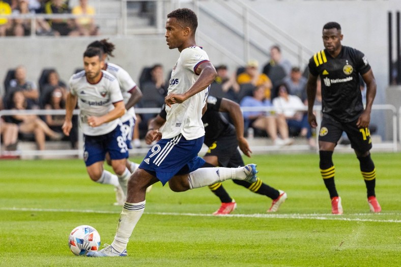 Aug 4, 2021; Columbus, Ohio, USA; D.C. United forward Ola Kamara (9) scores his second goal of the game against the Columbus Crew from the penalty spot in the first half at Lower.com Stadium. Mandatory Credit: Trevor Ruszkowski-USA TODAY Sports