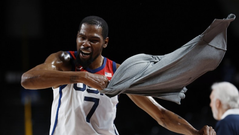 Aug 5, 2021; Saitama, Japan; United States forward Kevin Durant (7) celebrates on the bench against Australia in the third quarter during the Tokyo 2020 Olympic Summer Games at Saitama Super Arena. Mandatory Credit: Geoff Burke-USA TODAY Sports