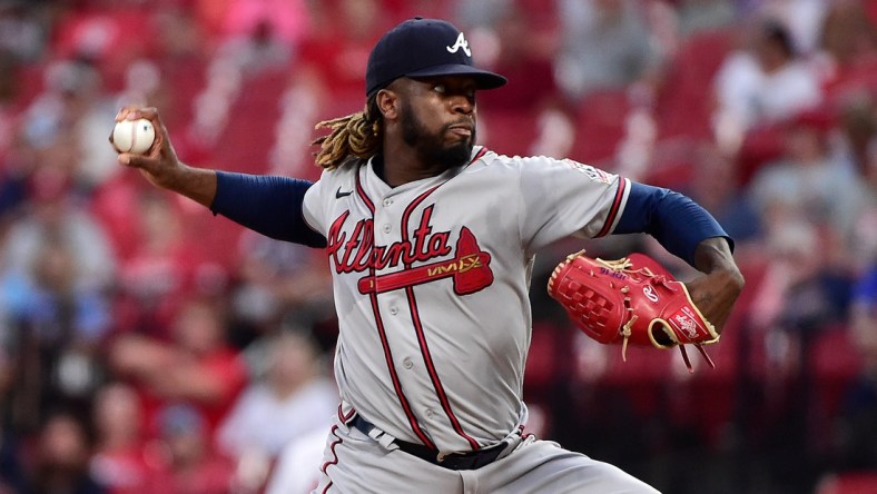 Aug 5, 2021; St. Louis, Missouri, USA;  Atlanta Braves starting pitcher Touki Toussaint (62) pitches during the first inning against the St. Louis Cardinals at Busch Stadium. Mandatory Credit: Jeff Curry-USA TODAY Sports