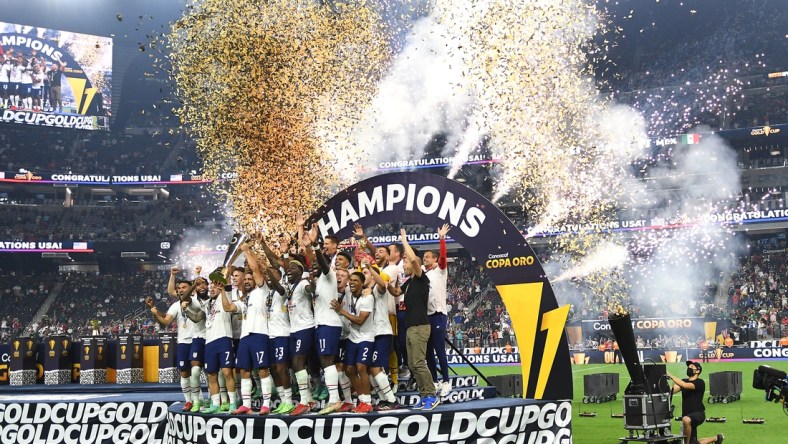 Aug 1, 2021; Las Vegas, Nevada, USA; USA players celebrate after defeating Mexico 1-0 in extra time to win the CONCACAF Gold Cup final soccer match at Allegiant Stadium. Mandatory Credit: Stephen R. Sylvanie-USA TODAY Sports