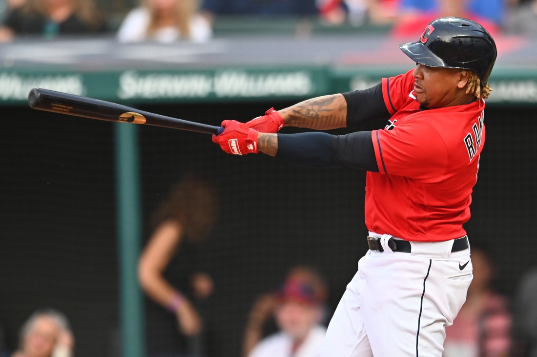 Aug 6, 2021; Cleveland, Ohio, USA; Cleveland Indians designated hitter Jose Ramirez (11) hits a double during the third inning against the Detroit Tigers at Progressive Field. Mandatory Credit: Ken Blaze-USA TODAY Sports