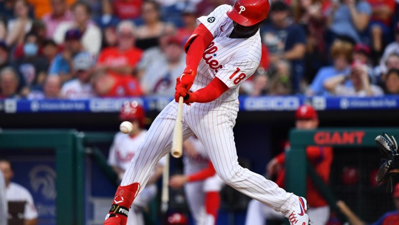 Aug 6, 2021; Philadelphia, Pennsylvania, USA; Philadelphia Phillies shortstop Didi Gregorius (18) hits a solo home run in the second inning against the New York Mets at Citizens Bank Park. Mandatory Credit: Kyle Ross-USA TODAY Sports