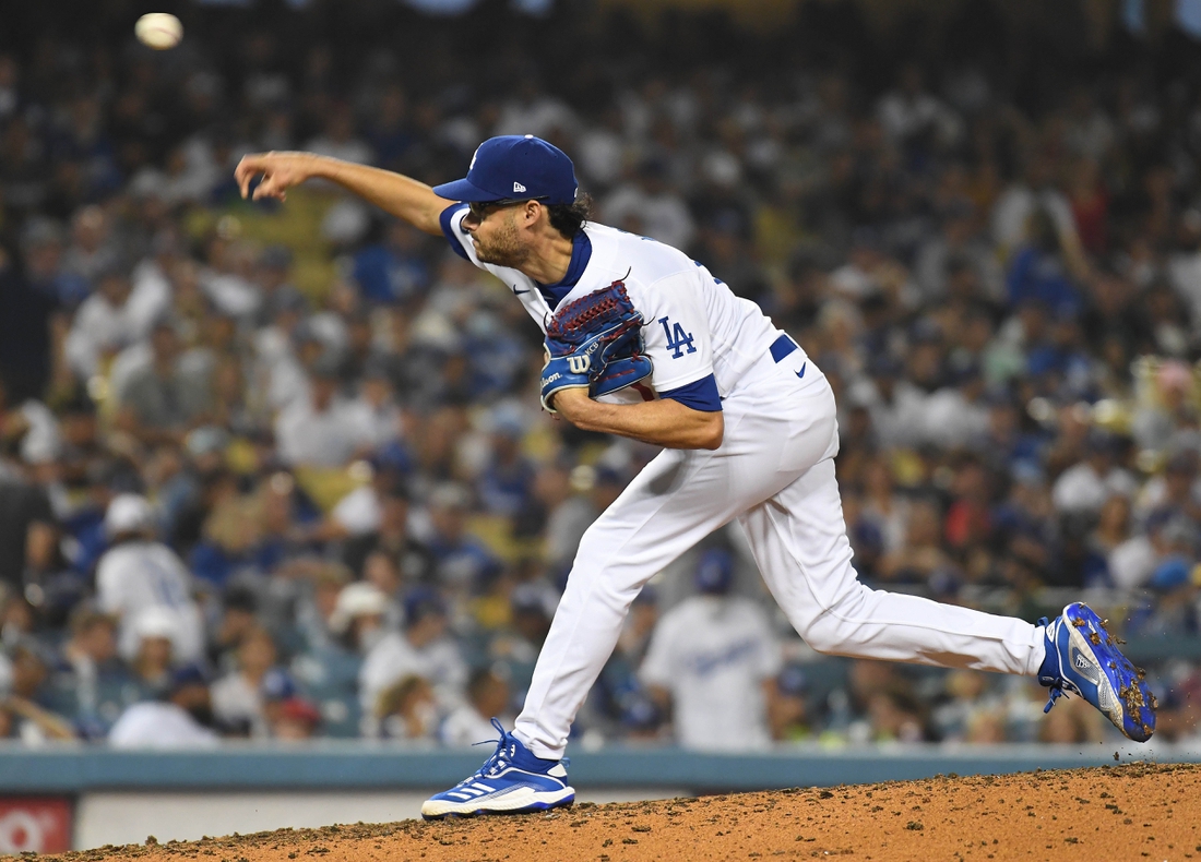 Aug 6, 2021; Los Angeles, California, USA; Los Angeles Dodgers relief pitcher Joe Kelly (17) throws against the Los Angeles Angels during the seventh inning at Dodger Stadium. Mandatory Credit: Richard Mackson-USA TODAY Sports