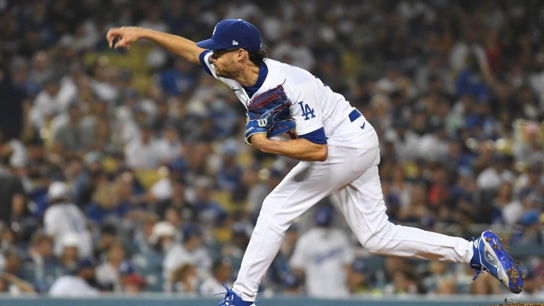 Aug 6, 2021; Los Angeles, California, USA; Los Angeles Dodgers relief pitcher Joe Kelly (17) throws against the Los Angeles Angels during the seventh inning at Dodger Stadium. Mandatory Credit: Richard Mackson-USA TODAY Sports