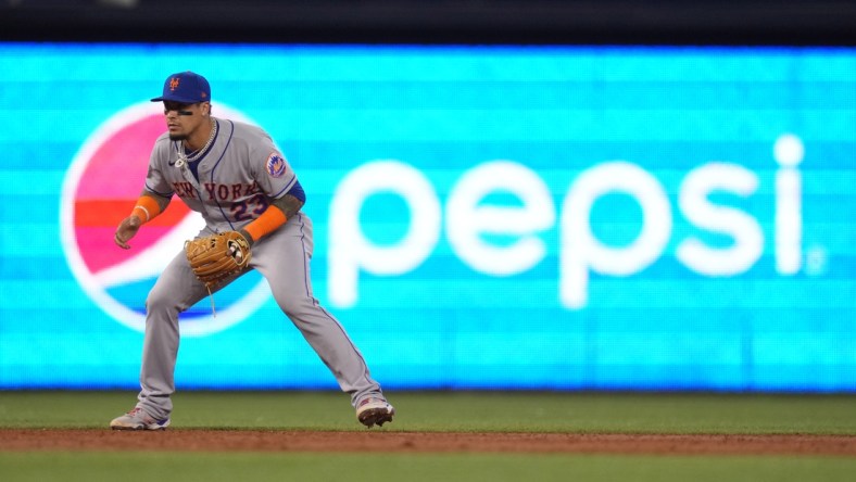 Aug 5, 2021; Miami, Florida, USA; New York Mets shortstop Javier Baez (23) fields his position in the game against the Miami Marlins at loanDepot park. Mandatory Credit: Jasen Vinlove-USA TODAY Sports